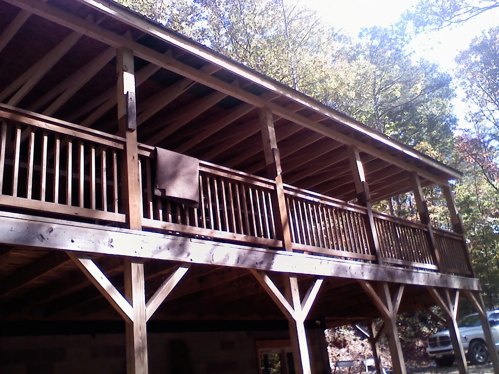 Timber framing under a new elevated porch and deck — Roof Leak Repair in Surry by Roofing Brothers